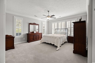 Elegant all-brick golf-front living with sweeping 9th-fairway on International Club of Myrtle Beach in South Carolina - for sale on GolfHomes.com, golf home, golf lot