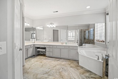 Elegant all-brick golf-front living with sweeping 9th-fairway on International Club of Myrtle Beach in South Carolina - for sale on GolfHomes.com, golf home, golf lot