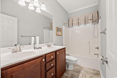 Elegant all-brick golf-front living with sweeping 9th-fairway on International Club of Myrtle Beach in South Carolina - for sale on GolfHomes.com, golf home, golf lot