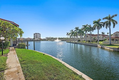 Live the Good Life at Bahia Del Mar!
Wake up to tranquil lake on Isla Del Sol Yacht and Country Club in Florida - for sale on GolfHomes.com, golf home, golf lot