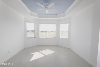 IMMEDIATE MOVE IN READY HOME! Put your TOES IN THE SAND in the on LPGA International Golf Course in Florida - for sale on GolfHomes.com, golf home, golf lot