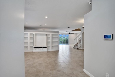 Located on a quiet, tree-lined street and surrounded by lush on The Links At Madison Green in Florida - for sale on GolfHomes.com, golf home, golf lot