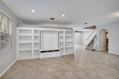 Located on a quiet, tree-lined street and surrounded by lush on The Links At Madison Green in Florida - for sale on GolfHomes.com, golf home, golf lot
