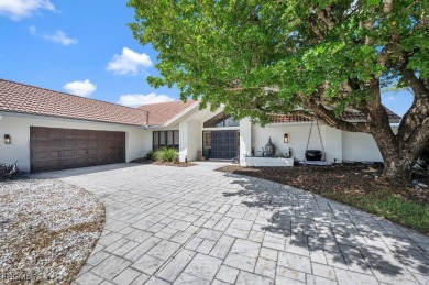 Beautiful 4 bedroom, 2.5 bath pool home on large, elevated lot on Eagle Ridge Golf and Tennis Club in Florida - for sale on GolfHomes.com, golf home, golf lot