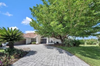 Beautiful 4 bedroom, 2.5 bath pool home on large, elevated lot on Eagle Ridge Golf and Tennis Club in Florida - for sale on GolfHomes.com, golf home, golf lot