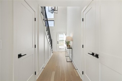 Discover modern, low-maintenance luxury living in this stunning on The Golf Club of Kansas in Kansas - for sale on GolfHomes.com, golf home, golf lot