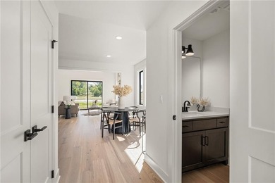 Discover modern, low-maintenance luxury living in this stunning on The Golf Club of Kansas in Kansas - for sale on GolfHomes.com, golf home, golf lot