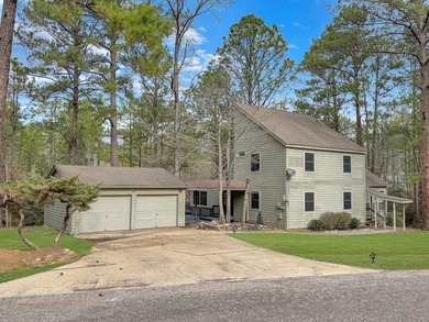 Nestled among beautiful mature trees, this two story 3bd, 2.5ba on Rayburn Country Club in Texas - for sale on GolfHomes.com, golf home, golf lot