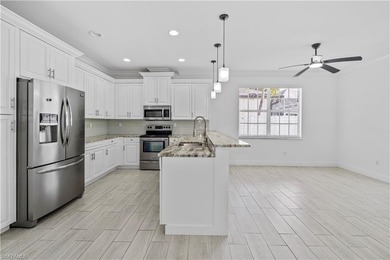 Welcome to this beautifully renovated residence offering the on TPC At Treviso Bay in Florida - for sale on GolfHomes.com, golf home, golf lot