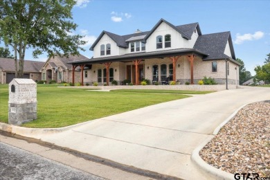 Welcome to your beautiful new 2 story sanctuary at 112 Ryder Cup on Hide-A-Way Lake Golf Course in Texas - for sale on GolfHomes.com, golf home, golf lot