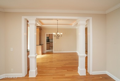 Gorgeous custom brick home sitting on a private .48/acre cul de on Ocean Ridge Plantation in North Carolina - for sale on GolfHomes.com, golf home, golf lot