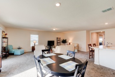 Discover this stunning lake-view home on a spacious corner lot! on Grand Reserve Golf Course in Florida - for sale on GolfHomes.com, golf home, golf lot