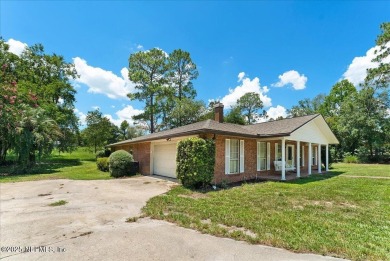 Live the good life in this beautifully maintained, move-in ready on Keystone Heights Golf and Country Club in Florida - for sale on GolfHomes.com, golf home, golf lot
