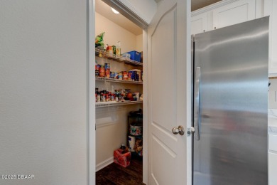 Discover this stunning lake-view home on a spacious corner lot! on Grand Reserve Golf Course in Florida - for sale on GolfHomes.com, golf home, golf lot