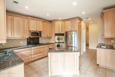 Gorgeous custom brick home sitting on a private .48/acre cul de on Ocean Ridge Plantation in North Carolina - for sale on GolfHomes.com, golf home, golf lot