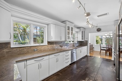 The owners are downsizing, creating a rare opportunity to own on Lake Worth Municipal Golf Course in Florida - for sale on GolfHomes.com, golf home, golf lot