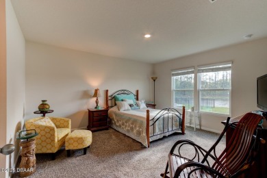 Discover this stunning lake-view home on a spacious corner lot! on Grand Reserve Golf Course in Florida - for sale on GolfHomes.com, golf home, golf lot