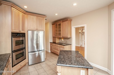 Gorgeous custom brick home sitting on a private .48/acre cul de on Ocean Ridge Plantation in North Carolina - for sale on GolfHomes.com, golf home, golf lot