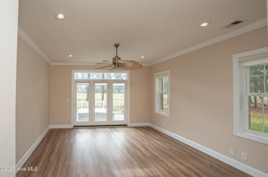 Gorgeous custom brick home sitting on a private .48/acre cul de on Ocean Ridge Plantation in North Carolina - for sale on GolfHomes.com, golf home, golf lot