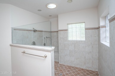 Gorgeous custom brick home sitting on a private .48/acre cul de on Ocean Ridge Plantation in North Carolina - for sale on GolfHomes.com, golf home, golf lot