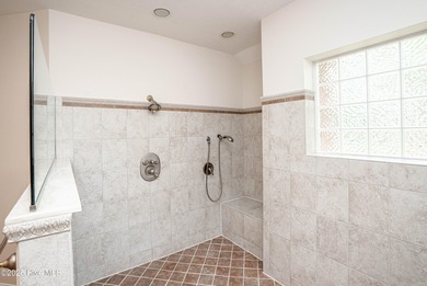 Gorgeous custom brick home sitting on a private .48/acre cul de on Ocean Ridge Plantation in North Carolina - for sale on GolfHomes.com, golf home, golf lot