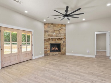 tep into this warm and charming BRAND NEW Construction Home on on Wolf Ridge Golf Course in Oklahoma - for sale on GolfHomes.com, golf home, golf lot