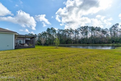 Discover this stunning lake-view home on a spacious corner lot! on Grand Reserve Golf Course in Florida - for sale on GolfHomes.com, golf home, golf lot