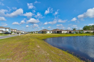 Discover this stunning lake-view home on a spacious corner lot! on Grand Reserve Golf Course in Florida - for sale on GolfHomes.com, golf home, golf lot
