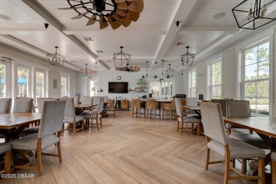 Discover this stunning lake-view home on a spacious corner lot! on Grand Reserve Golf Course in Florida - for sale on GolfHomes.com, golf home, golf lot