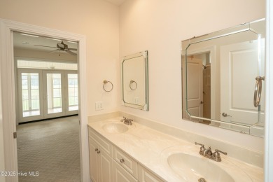 Gorgeous custom brick home sitting on a private .48/acre cul de on Ocean Ridge Plantation in North Carolina - for sale on GolfHomes.com, golf home, golf lot