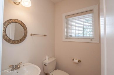 Gorgeous custom brick home sitting on a private .48/acre cul de on Ocean Ridge Plantation in North Carolina - for sale on GolfHomes.com, golf home, golf lot