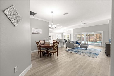 *NEW ROOF (2024)* *GOLF-CART GARAGE* * SOLAR HEATED PRIVATE on Bella Glade Country Club in Florida - for sale on GolfHomes.com, golf home, golf lot