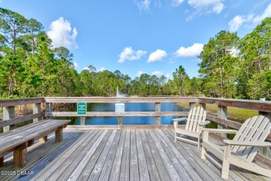 Discover this stunning lake-view home on a spacious corner lot! on Grand Reserve Golf Course in Florida - for sale on GolfHomes.com, golf home, golf lot