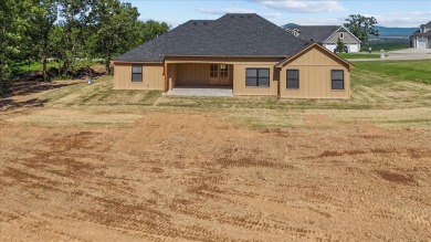 tep into this warm and charming BRAND NEW Construction Home on on Wolf Ridge Golf Course in Oklahoma - for sale on GolfHomes.com, golf home, golf lot