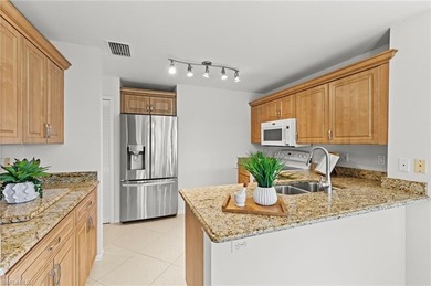 Sweeping lake and golf course views with no buildings beyond on Estero Country Club in Florida - for sale on GolfHomes.com, golf home, golf lot