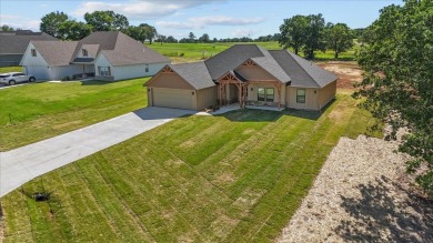 tep into this warm and charming BRAND NEW Construction Home on on Wolf Ridge Golf Course in Oklahoma - for sale on GolfHomes.com, golf home, golf lot