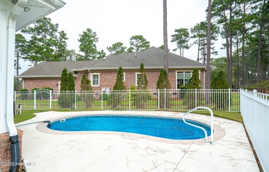 Gorgeous custom brick home sitting on a private .48/acre cul de on Ocean Ridge Plantation in North Carolina - for sale on GolfHomes.com, golf home, golf lot