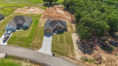 tep into this warm and charming BRAND NEW Construction Home on on Wolf Ridge Golf Course in Oklahoma - for sale on GolfHomes.com, golf home, golf lot