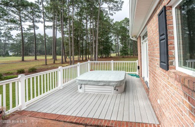 Gorgeous custom brick home sitting on a private .48/acre cul de on Ocean Ridge Plantation in North Carolina - for sale on GolfHomes.com, golf home, golf lot