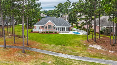Gorgeous custom brick home sitting on a private .48/acre cul de on Ocean Ridge Plantation in North Carolina - for sale on GolfHomes.com, golf home, golf lot