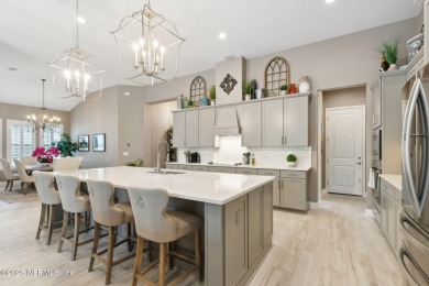 Experience luxury living in this stunning custom home in Amelia on Amelia National Golf and Country Club in Florida - for sale on GolfHomes.com, golf home, golf lot