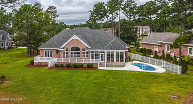 Gorgeous custom brick home sitting on a private .48/acre cul de on Ocean Ridge Plantation in North Carolina - for sale on GolfHomes.com, golf home, golf lot