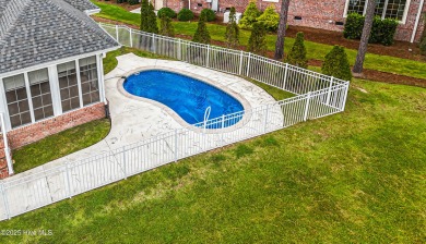 Gorgeous custom brick home sitting on a private .48/acre cul de on Ocean Ridge Plantation in North Carolina - for sale on GolfHomes.com, golf home, golf lot