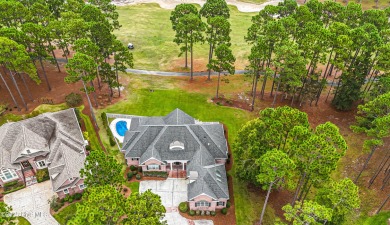 Gorgeous custom brick home sitting on a private .48/acre cul de on Ocean Ridge Plantation in North Carolina - for sale on GolfHomes.com, golf home, golf lot