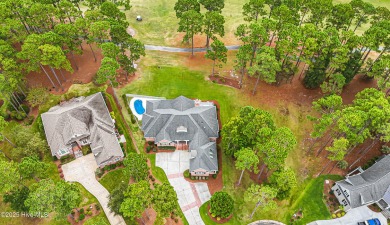 Gorgeous custom brick home sitting on a private .48/acre cul de on Ocean Ridge Plantation in North Carolina - for sale on GolfHomes.com, golf home, golf lot