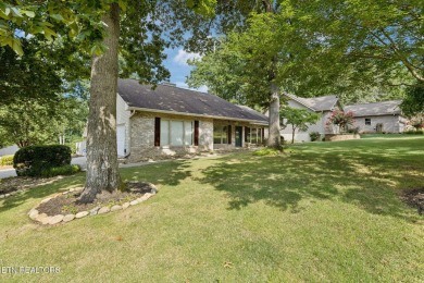 Set on a prime corner lot in the heart of Tellico Village, this on Toqua Golf Course - Loudon County in Tennessee - for sale on GolfHomes.com, golf home, golf lot