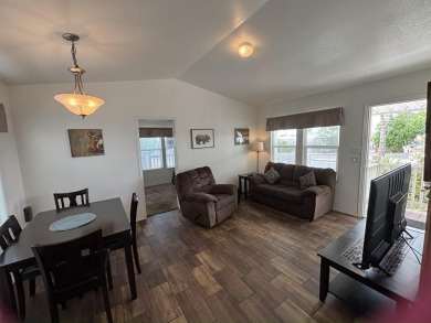 Right now, you could own a 2018 model 2 bed/2 bath, 748.00 sq on Viewpoint Golf Resort in Arizona - for sale on GolfHomes.com, golf home, golf lot
