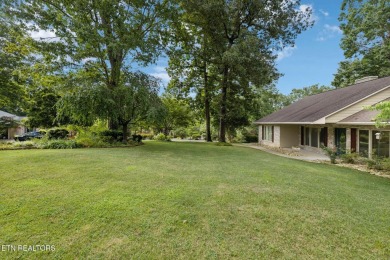 Set on a prime corner lot in the heart of Tellico Village, this on Toqua Golf Course - Loudon County in Tennessee - for sale on GolfHomes.com, golf home, golf lot