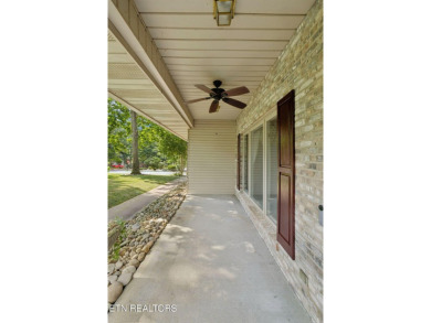 Set on a prime corner lot in the heart of Tellico Village, this on Toqua Golf Course - Loudon County in Tennessee - for sale on GolfHomes.com, golf home, golf lot