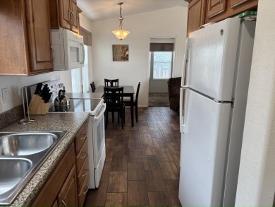 Right now, you could own a 2018 model 2 bed/2 bath, 748.00 sq on Viewpoint Golf Resort in Arizona - for sale on GolfHomes.com, golf home, golf lot
